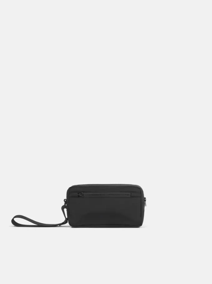 Gepolsterte Reißverschlusstasche mit Taschen und Riemen