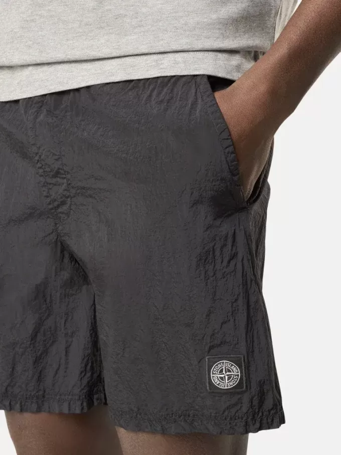 Regular-Fit-Badehose in mittlerer Länge mit Taschen Regular-Fit-Badehose in mittlerer Länge mit Taschen